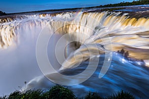 Puerto Iguazu - June 24, 2017: The Devil`s Throat site at the Iguazu Waterfalls, Wonder of the world, at Puerto Iguazu, Argentina