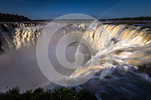 Puerto Iguazu - June 24, 2017: The Devil`s Throat site at the Iguazu Waterfalls, Wonder of the world, at Puerto Iguazu, Argentina