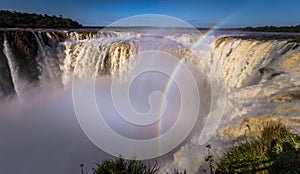 Puerto Iguazu - June 24, 2017: The Devil`s Throat site at the Iguazu Waterfalls, Wonder of the world, at Puerto Iguazu, Argentina