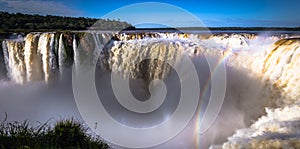 Puerto Iguazu - June 24, 2017: The Devil`s Throat site at the Iguazu Waterfalls, Wonder of the world, at Puerto Iguazu, Argentina