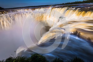 Puerto Iguazu - June 24, 2017: The Devil`s Throat site at the Iguazu Waterfalls, Wonder of the world, at Puerto Iguazu, Argentina