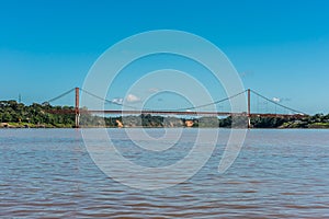 Puerto Maldonado bridge in the peruvian Amazon jungle at Madre d photo