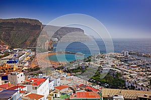 Puerto Mogan, Gran Canaria, Holiday in Canary Island, Spain, Europe. Small town on the south coast. Summer in Puerto Mogan, blue s