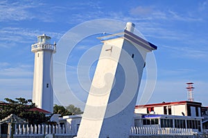 Puerto Morelos new and old inclined lighthouses photo