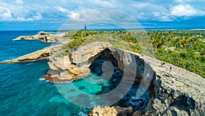 Aerial view of Puerto Rico. Faro Los Morrillos de Cabo Rojo. Playa Sucia beach and Salt lakes in Punta Jaguey. photo