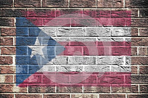 Puerto Rico flag on old brick wall background