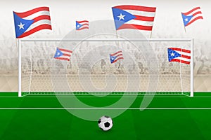 Puerto Rico football team fans with flags of Puerto Rico cheering on stadium, penalty kick concept in a soccer match