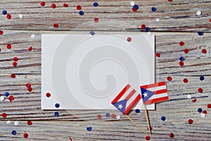 Puerto Rico independence day. day of constitution 25 July. the concept of veterans Day or memorial. mini flags and confetti with