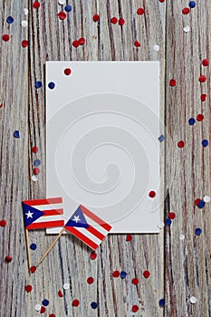 Puerto Rico independence day. day of constitution 25 July. the concept of veterans Day or memorial. mini flags and confetti with