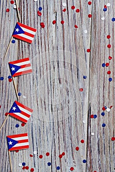 puerto Rico independence day. day of constitution 25 July. the concept of veterans Day or memorial. mini flags and confetti on