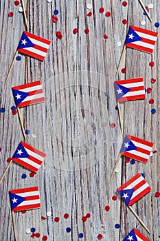 puerto Rico independence day. day of constitution 25 July. the concept of veterans Day or memorial. mini flags and confetti on