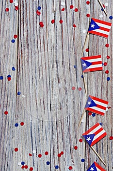 puerto Rico independence day. day of constitution 25 July. the concept of veterans Day or memorial. mini flags and confetti on