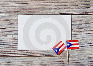 Puerto Rico independence day. day of constitution 25 July. the concept of veterans Day or memorial . mini flags with sheets of