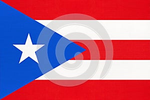 Puerto Rico national fabric flag, textile background. Caribbean state official sign