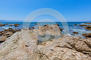 Puerto Vallarta, Conchas Chinas beach and ocean coastline photo