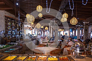 Puerto Vallarta, Mexico-20 January, 2020: Restaurants and cafes with ocean views on Playa De Los Muertos beach and pier close to