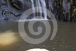 PUERTO VALLARTA MEXICO SEPTEMBER 11 ,2019:Waterfall in Yelapa, tropical beach tourists swimming under the waterfall during their