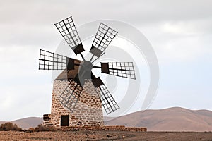 Puesta del sol de Tefia windmill (Fuerteventura - Spain) photo