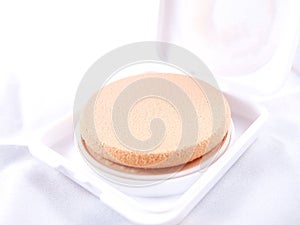 Puff, make-up sponge on beige powder refill