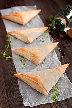 Puff pastry cheese and spinach triangles
