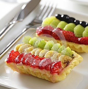 Puff pastry filled with strawberry, banana and kiwi fruit