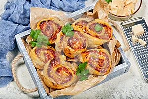 Puff pastry Pizza rolls with ham and cheese photo