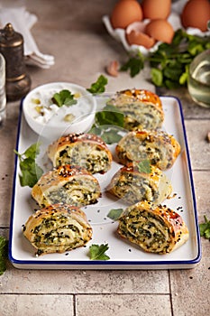 Puff pastry Pizza rolls with spinach, cheese, feta and garlic