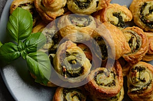 Puff pastry rolls with spinach and greek cheese filling