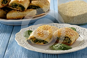 Puff pastry rolls with spinach and ricotta.