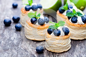 Puff pastry stuffed with soft cream cheese and blueberry with l