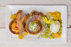 Puff pastry vol-au-vents shaped like an easter bunny filled with mango and avocado