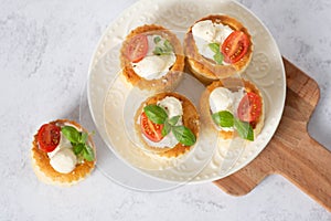 puff pastry vol-au-vents stuffed with tomatoes
