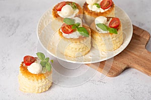 puff pastry vol-au-vents stuffed with tomatoes