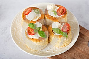 puff pastry vol-au-vents stuffed with tomatoes