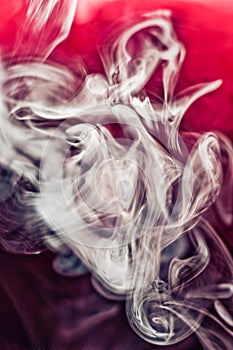 Puff of smoke on red
