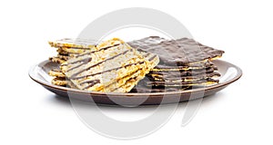 Puffed corn crackers chocolate covered isolated on white background