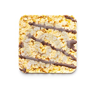 Puffed corn crackers chocolate covered isolated on white background