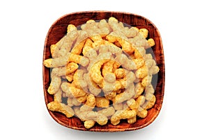 Puffed corn snacks with cheese and peanuts