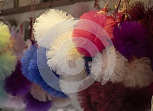 Puffs of tulle produced from textile products