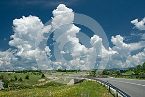 Puffy clouds in countryside