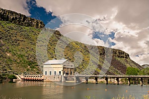 Puffy clouds over the Diversion dam on the Boise River