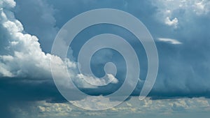 Puffy fluffy white clouds blue sky raining time lapse motion background. Clouds Forming In Dramatic Sky. Nature Environment cloud