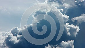 Puffy fluffy white clouds blue sky time lapse motion background.