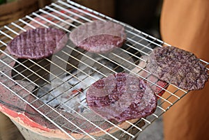 Puk sesame rice is a snack of northern Thailand , made from mixed black glutinous rice and sticky sesame seeds