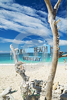 Puka beach in boracay island philippines photo