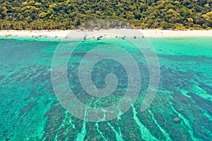 Puka Shell Beach, Boracay Island, Philippines, aerial view. Colorful lagoon with clear water and coral bottom