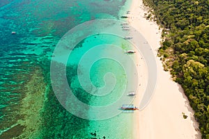 Puka Shell Beach. Wide tropical beach with white sand. Beautiful white beach and azure water on Boracay island, Philippines, top