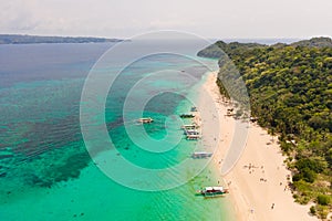 Puka Shell Beach. Wide tropical beach with white sand. Beautiful white beach and azure water on Boracay island, Philippines, top