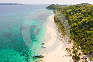 Puka Shell Beach. Wide tropical beach with white sand. Beautiful white beach and azure water on Boracay island, Philippines, top