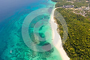 Puka Shell Beach. Wide tropical beach with white sand. Beautiful white beach and azure water on Boracay island, Philippines, top